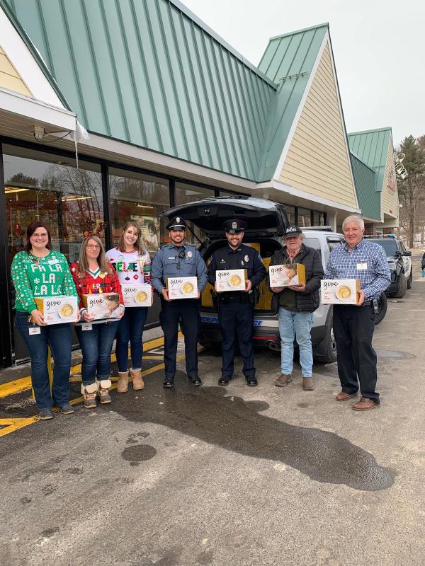 Camden Hannaford employees Mariah Singer, Candie Martin and Cory Fellows; Rockport Police Officer Tony Del Vecchio; Camden Police Officer Mark Bennett; David Dickey and Hannaford Store Manager Bob Josselyn. (Photo courtesy Bob Josselyn)