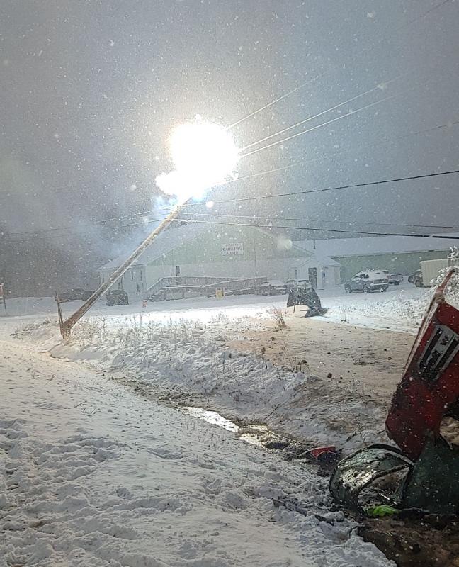 A fireball explodes from one of the broken CMP poles as police look on from a safe distance.
(photo courtesy of Belfast Police Sergeant Detective Matt Cook)