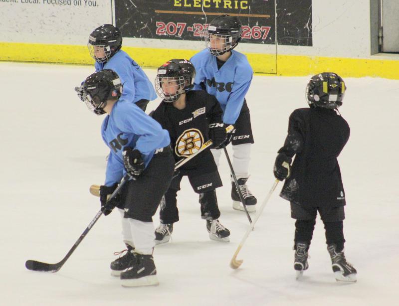 6U skaters participate in a skating session during a break of the Camden Hills varsity ice hockey game Jan. 4.