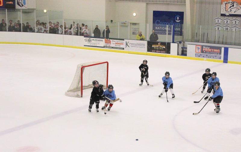 6U skaters participate in a skating session during a break of the Camden Hills varsity ice hockey game Jan. 4.
