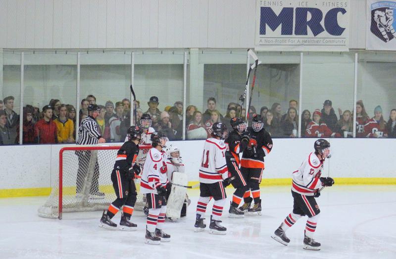 The Camden Hills varsity ice hockey team in its Jan. 4 game against Brunswick. (Courtesy Molly Cole)
