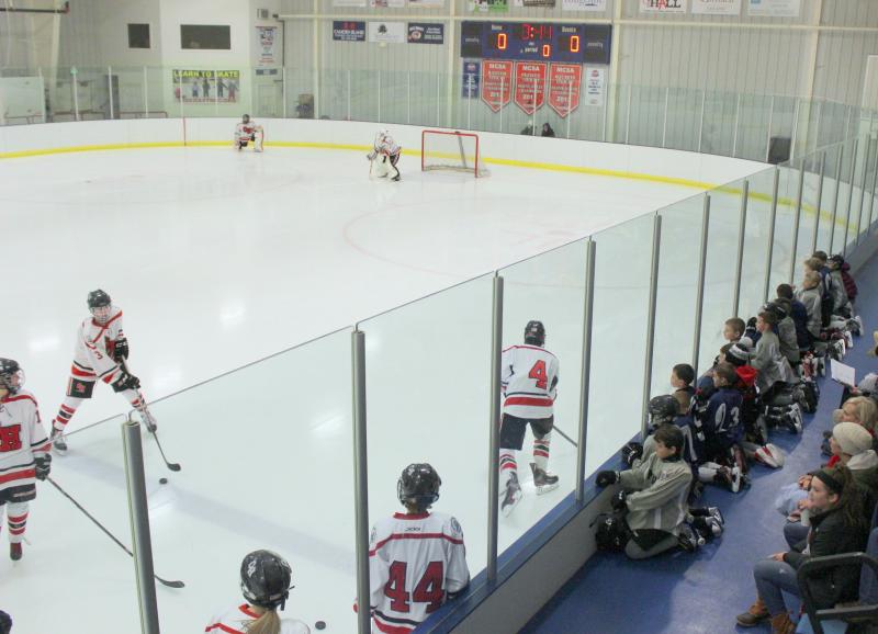 The Camden Hills ice hockey team in a Jan. 11 game. (Courtesy Molly Cole)