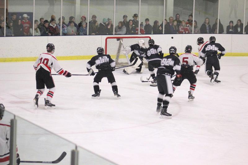 The Camden Hills ice hockey team in a Jan. 11 game. (Courtesy Molly Cole)