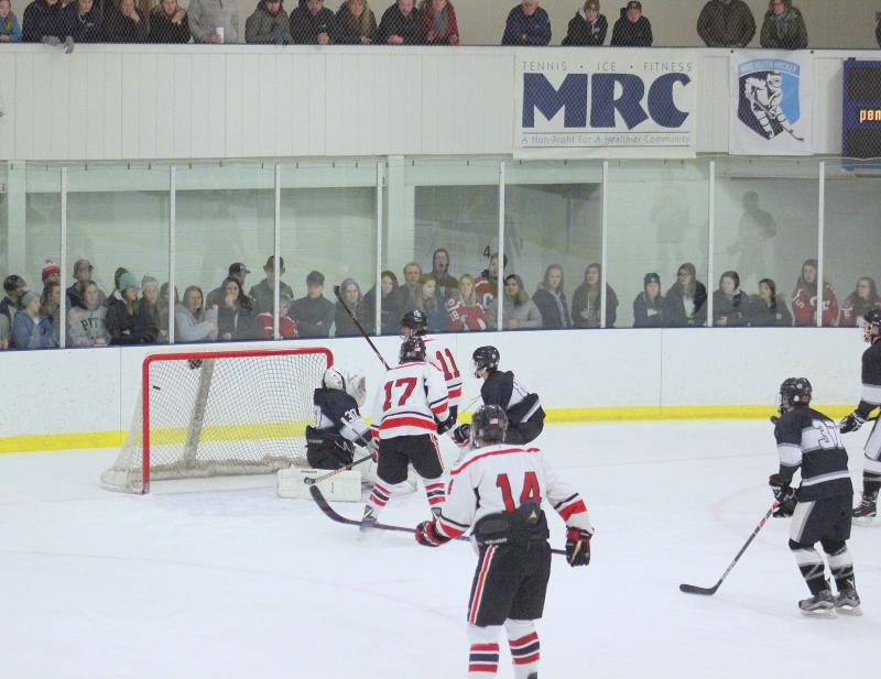 The Camden Hills ice hockey team in a Jan. 11 game. (Courtesy Molly Cole)