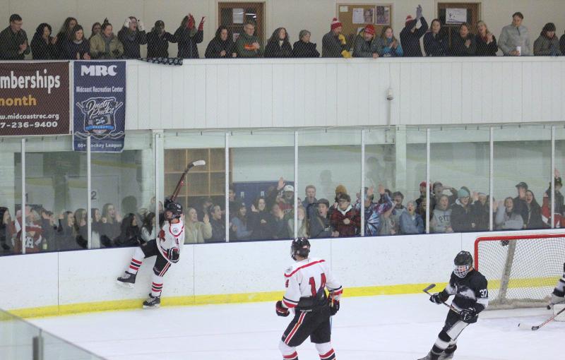 The Camden Hills ice hockey team in a Jan. 11 game. (Courtesy Molly Cole)