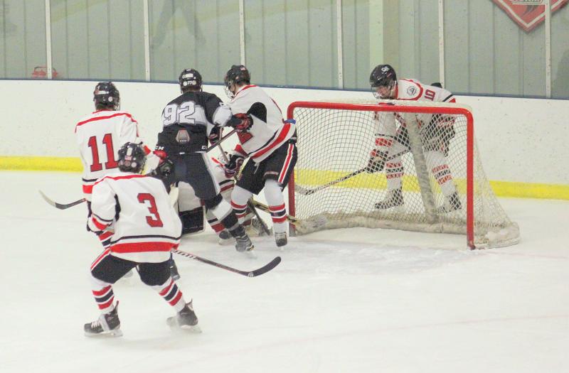 The Camden Hills ice hockey team in a Jan. 11 game. (Courtesy Molly Cole)