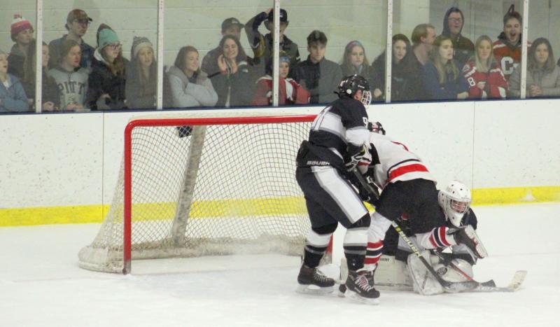 The Camden Hills ice hockey team in a Jan. 11 game. (Courtesy Molly Cole)