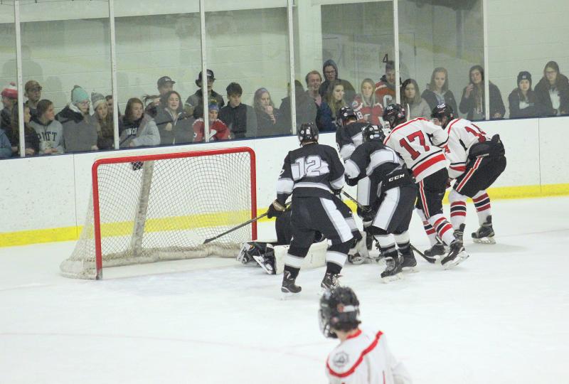 The Camden Hills ice hockey team in a Jan. 11 game. (Courtesy Molly Cole)
