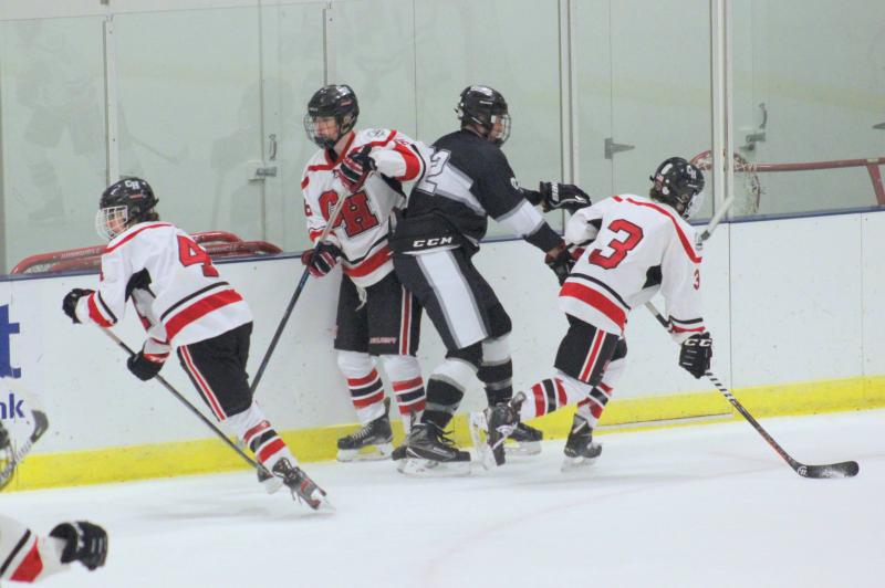 The Camden Hills ice hockey team in a Jan. 11 game. (Courtesy Molly Cole)