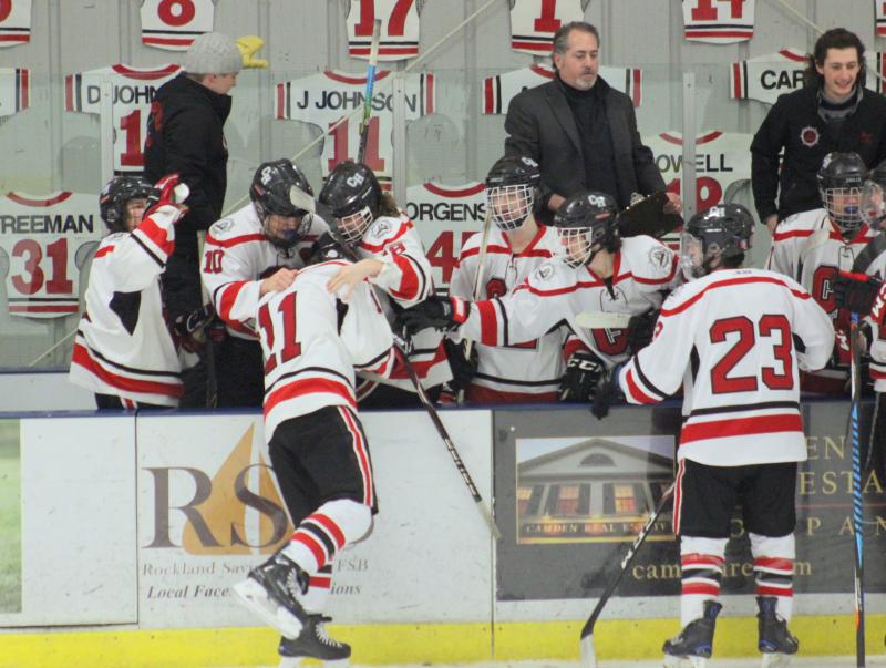 The Camden Hills ice hockey team in a Jan. 11 game. (Courtesy Molly Cole)