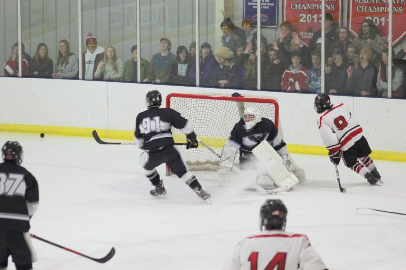 The Camden Hills ice hockey team in a Jan. 11 game. (Courtesy Molly Cole)