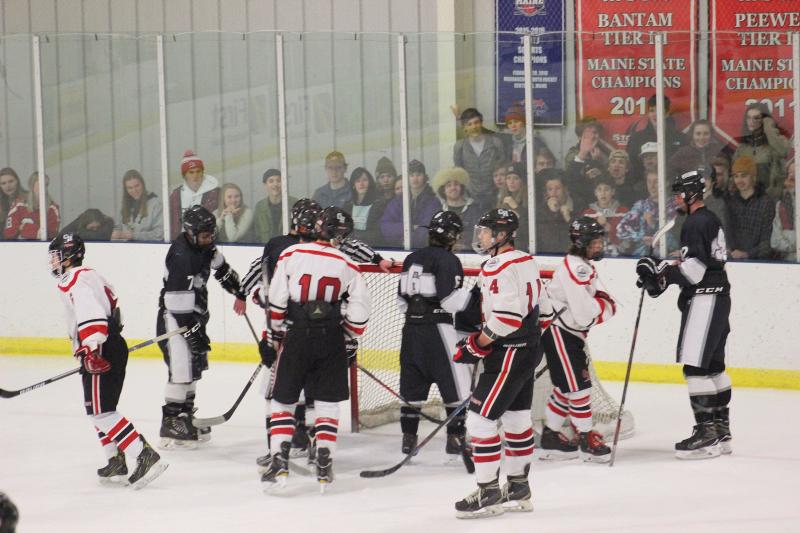 The Camden Hills ice hockey team in a Jan. 11 game. (Courtesy Molly Cole)