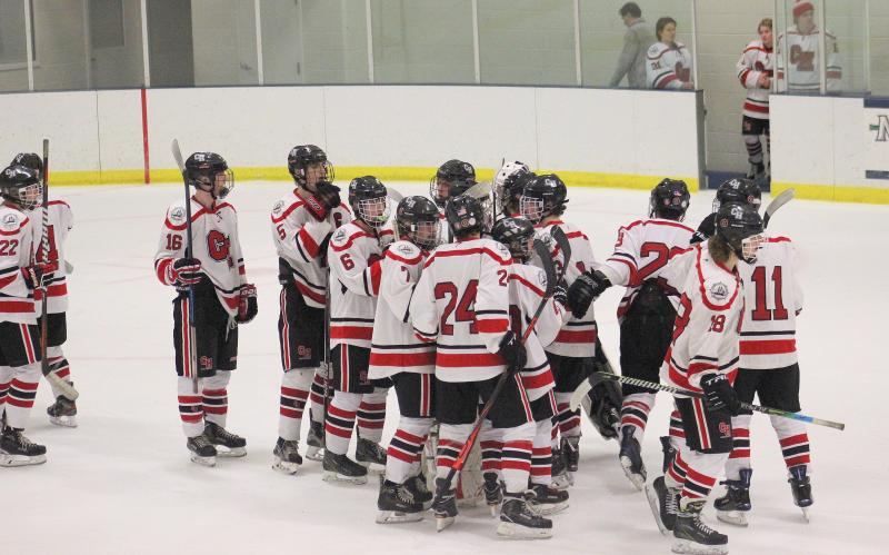 The Camden Hills ice hockey team in a Jan. 11 game. (Courtesy Molly Cole)