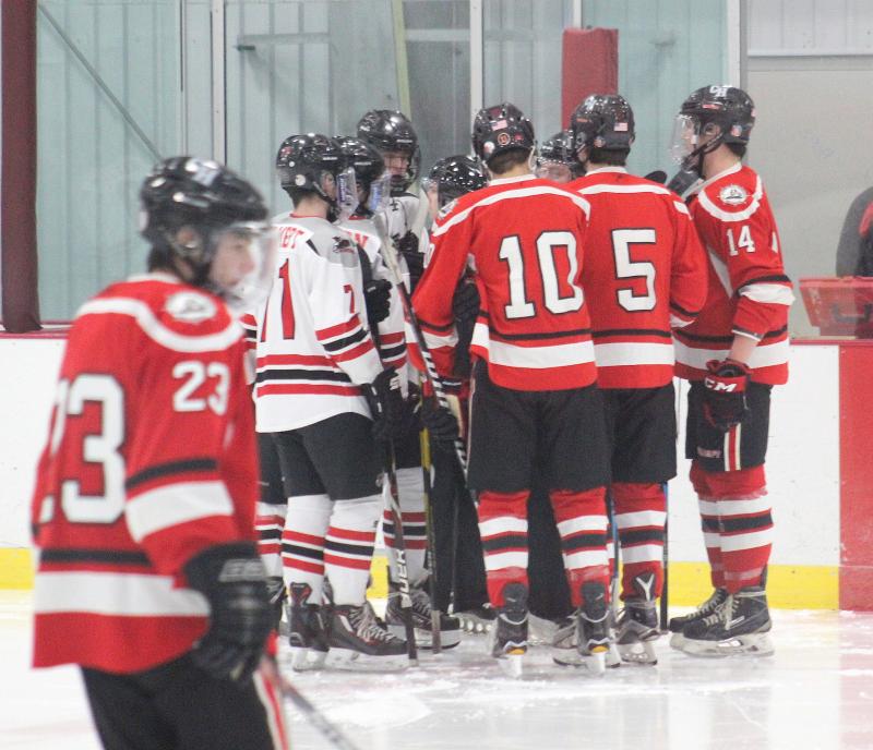 The Camden Hills varsity ice hockey team in a Jan. 14 game. (Courtesy Molly Cole)