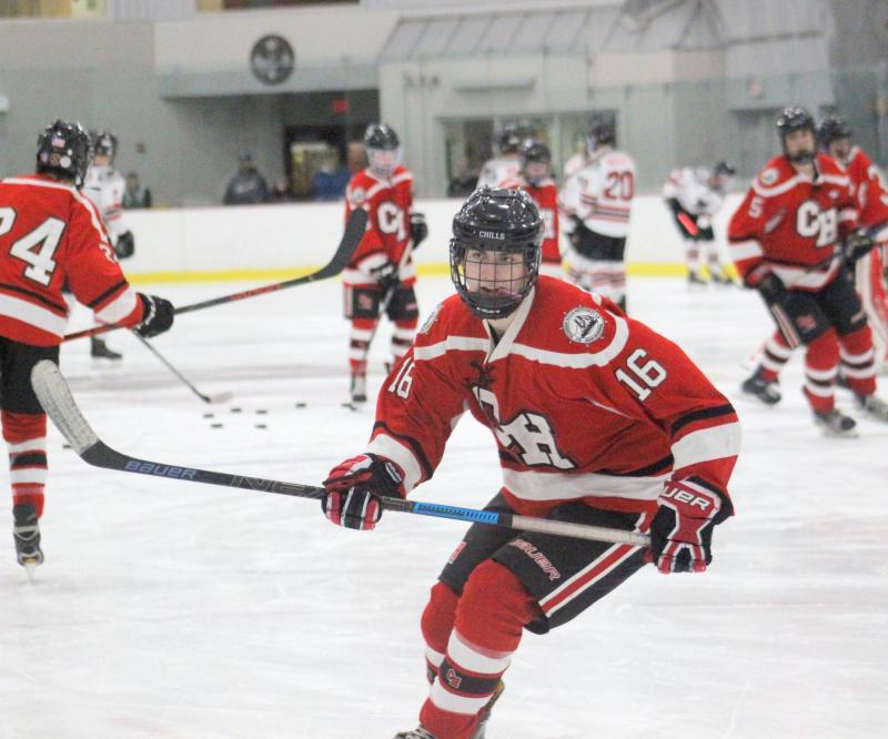 The Camden Hills varsity ice hockey team in a Jan. 14 game. (Courtesy Molly Cole)