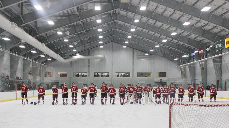 The Camden Hills varsity ice hockey team in a Jan. 14 game. (Courtesy Molly Cole)