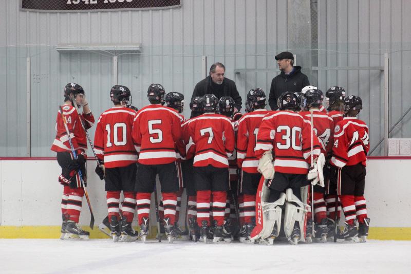 The Camden Hills varsity ice hockey team in a Jan. 14 game. (Courtesy Molly Cole)