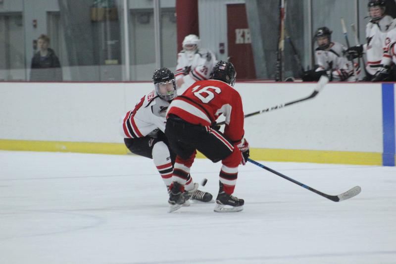 The Camden Hills varsity ice hockey team in a Jan. 14 game. (Courtesy Molly Cole)