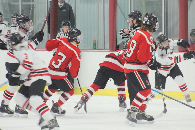 The Camden Hills varsity ice hockey team in a Jan. 14 game. (Courtesy Molly Cole)