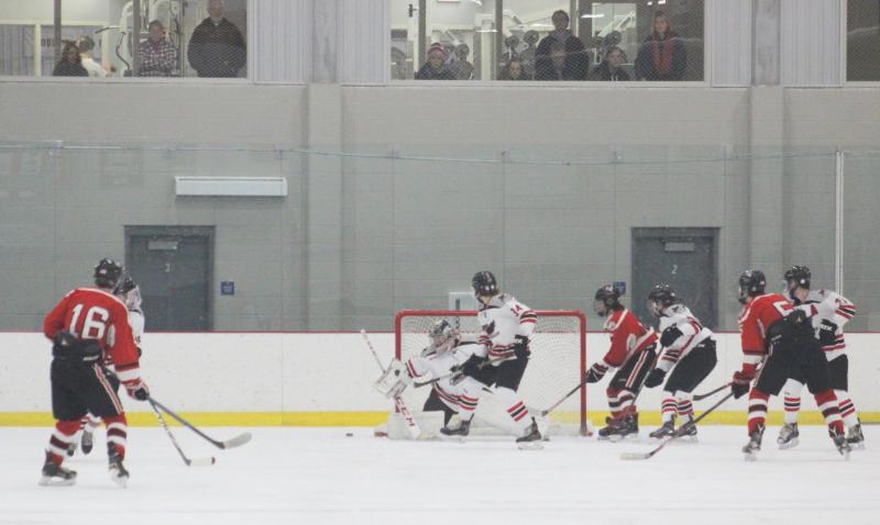 The Camden Hills varsity ice hockey team in a Jan. 14 game. (Courtesy Molly Cole)