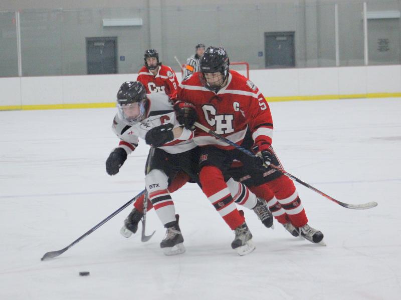 The Camden Hills varsity ice hockey team in a Jan. 14 game. (Courtesy Molly Cole)