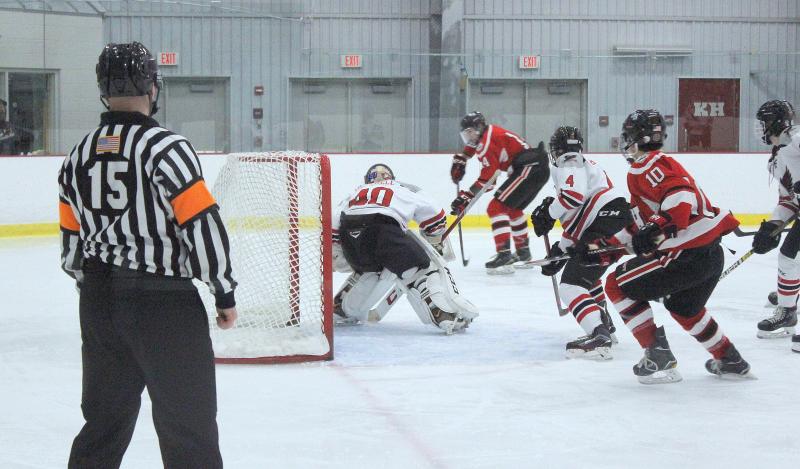 The Camden Hills varsity ice hockey team in a Jan. 14 game. (Courtesy Molly Cole)