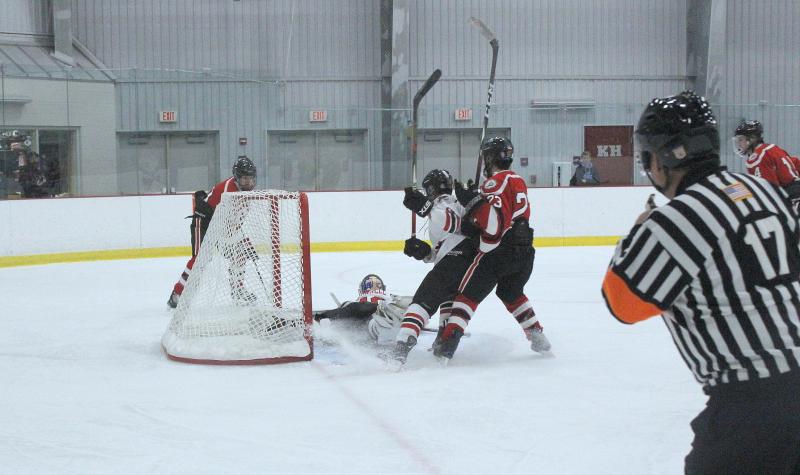 The Camden Hills varsity ice hockey team in a Jan. 14 game. (Courtesy Molly Cole)