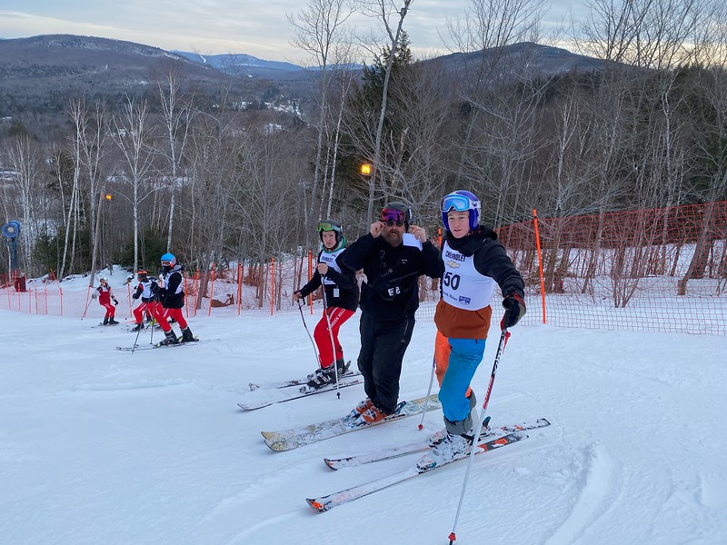 Camden Hills coach Barry King and skier Devon Smith (150). (Courtesy Mike Smith)