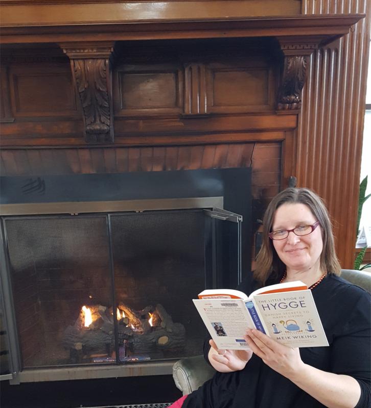 Librarian Patty King espousing the philosophy of Hygge at the Rockland Public Library. Photo courtesy Rockland Public Library.
