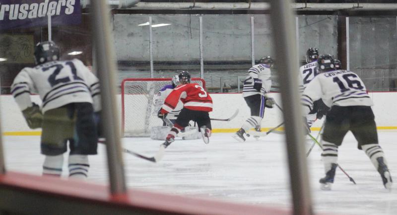 The Camden Hills ice hockey team during its Feb. 19 game. (Courtesy Molly Cole)