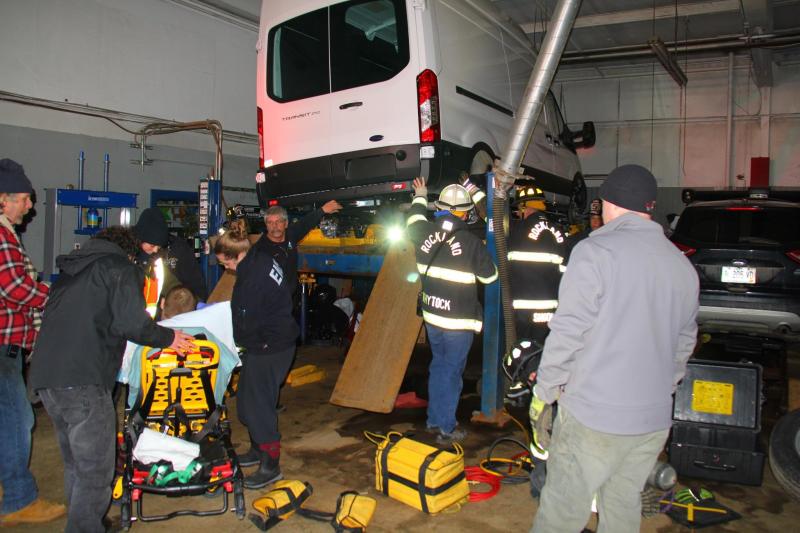 Rescue crews work to extricate an individual who was pinned by a mechanical lift. (Photo by Alan Athearn/Rockland Fire and EMS)
