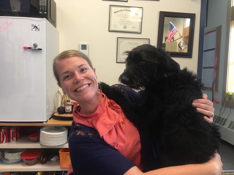 RSU 40 Assistant Superintendent Christina Wotton and Tilla, the therapy dog, at Medomak Middle School. (Photo courtesy RSU 40)