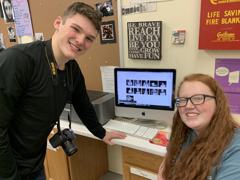 Medomak Valley sophomore Jame Rose and senior Emma Kavan work on the #WhyYouMatter campaign. (Courtesy Brooke Holland)