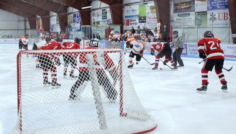 The Camden Hills ice hockey team in its Feb. 8 game against Brewer. (Courtesy Molly Cole)
