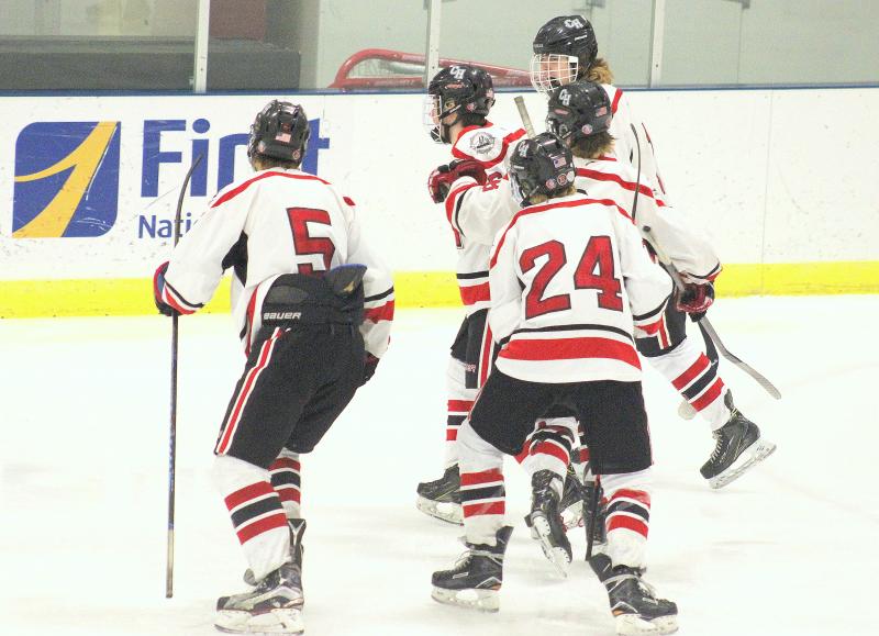 The Camden Hills ice hockey team in its Feb. 15 game against Hampden Academy. (Courtesy Molly Cole)