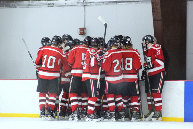 The Camden Hills ice hockey team during its Feb. 19 game. (Courtesy Molly Cole)