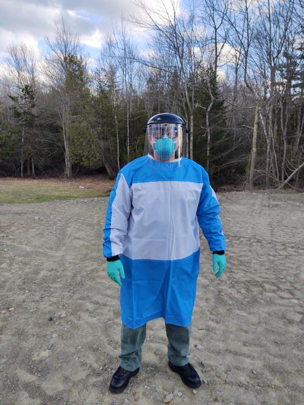 This is full protection for EMS personnel in days of COVID-19: A plastic face shield, durable and washable gown, gloves, N95 mask and (not seen in this photo) booties over the boots. (Photo courtesy Amy Dyer Drinkwater)