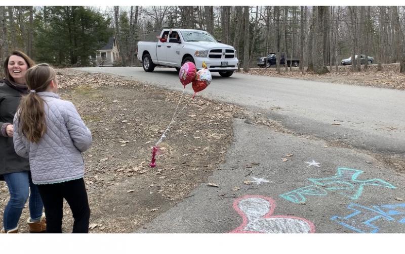 Cars and trucks drive by. (Photo courtesy Christina Tibbetts)
