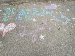 The neighbors even decorated the driveway with balloons and chalk art for her special day. (Photo courtesy Christina Tibbetts)