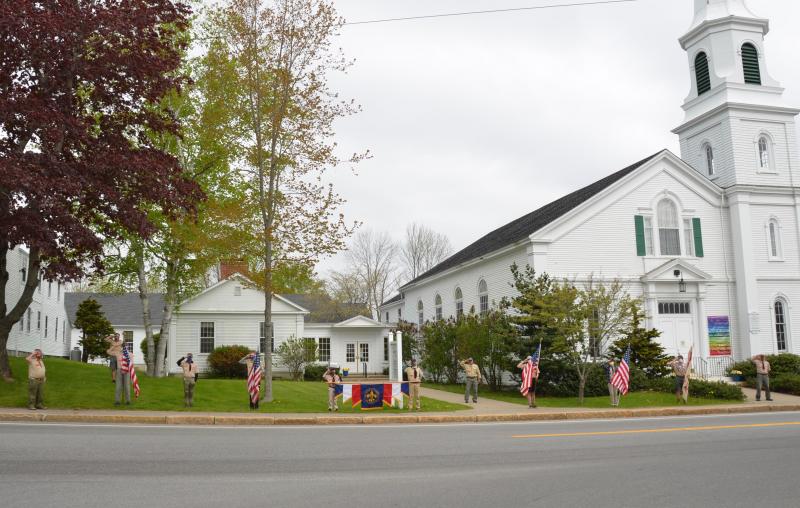 Boy Scout Troop 200 stands at attention outside the Elm Street Congregational Church in Camden on Memorial Day, 2020. (Photo by Lynda Clancy)