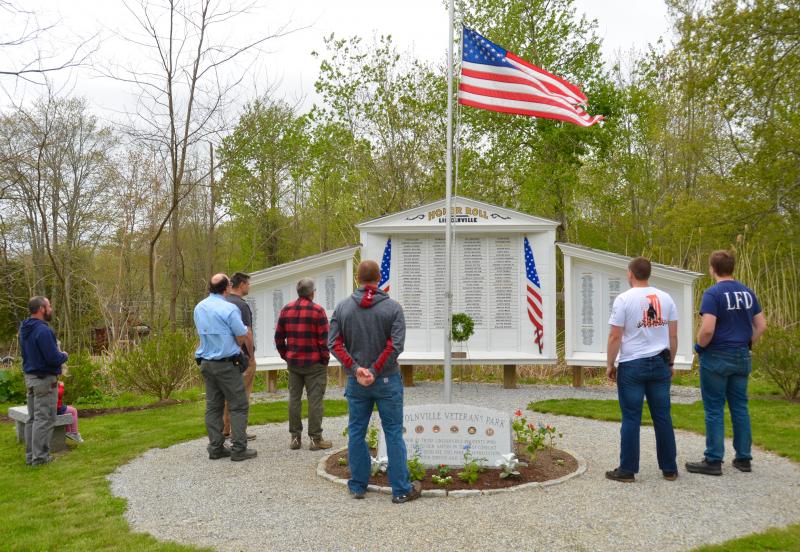 Lincolnville firefighters Don Fullington, Jr., Mike Eugley, Pete Rollins, Jonathan Ward, Nick Watts, Bradlee Watts, and Ben Hazen mark Memorial Day with a simple, heartfelt observance. (Photo by Lynda Clancy)