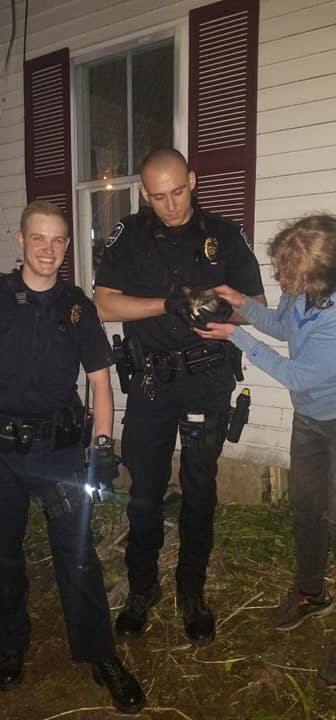 Rockland Police Officers Jordan Jandreau (left) and Jeff Aeschimann (right) and the rescued kitty. (Photo courtesy Rockland Police Department)