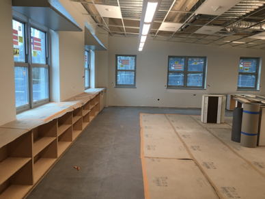 This is a picture of a science classroom. You can see the casework that is typical of every classroom. Science classrooms are stacked in the corners, getting extra windows with views to the woods. (Photo courtesy Steve Claffie)