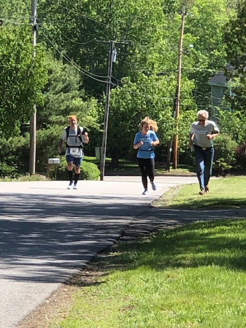 Abigail Nathan and her father, Jeff, running a graduation day half-marathon. (Courtesy Christine Nathan)