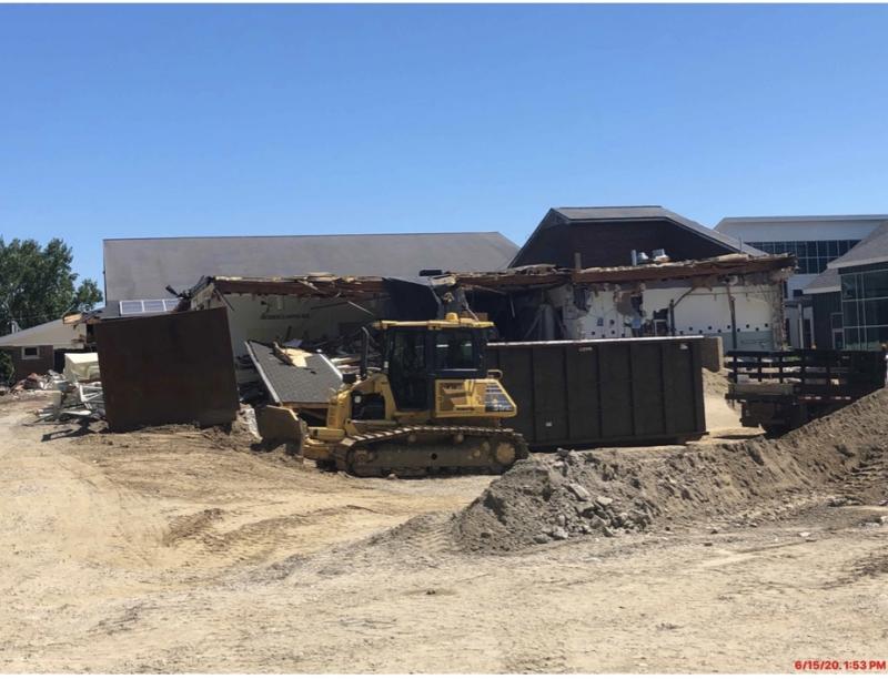 This photo shows the demolition of the Upper Wing (the former high school) and the new school being revealed in the upper right corner. (Photo courtesy Steve Claffie)