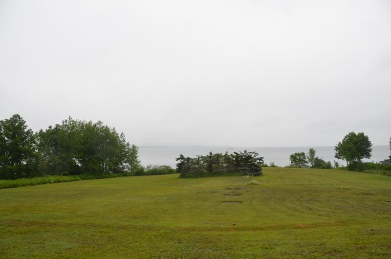 The 4.34 acres spread over former farm meadow land from Route 1 to the cobblestoned shoreline. (Photo by Lynda Clancy)