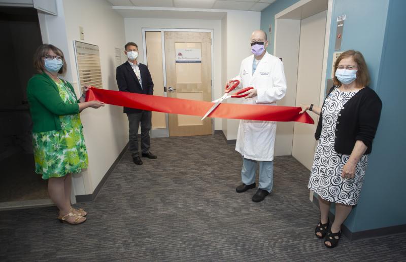 Kirk Bernadino, MD, medical director of Pen Bay Gastroenterology, cuts a ribbon to mark the official opening of the new gastroenterology suite in the Physicians Building on the campus of Pen Bay Medical Center. Above, left to right: Cindy Feyler, practice manager; Mark Fourre, MD, president of PBMC and Waldo County General Hospital; Dr. Bernadino; and Lyn Faller, director of physician practices. (Photo courtesy Pen Bay Medical Center)