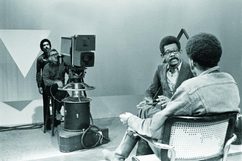(L to R) SOUL! director Stan Latham stands with cameraman on set for the interview between Host/Producer/Creator of the TV show SOUL! Ellis Haizlip with filmmaker Melvin Van Peebles (Sweet Sweetback’s Baaddass Song). (Courtesy Shoes in the Bed Productions)