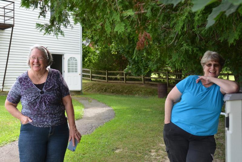 Pat Weaver, of Warren, and Robin Milliken, of Union, are not giving up the fight to help the victims who lost money when they made payments on contractor work that was never completed, or was shoddily done. (Photo by Lynda Clancy)