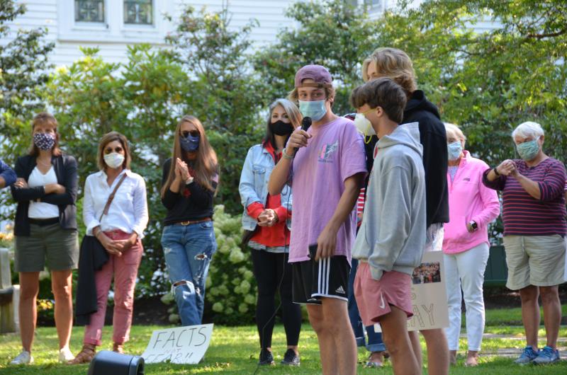 Camden Hills Regional High School students rally in downtown Camden Sept. 1, advocating to play in the state’s fall and winter schedule of competitive high school games. (Photo by Lynda Clancy)